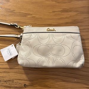 Coach cutout white wristlet NWT